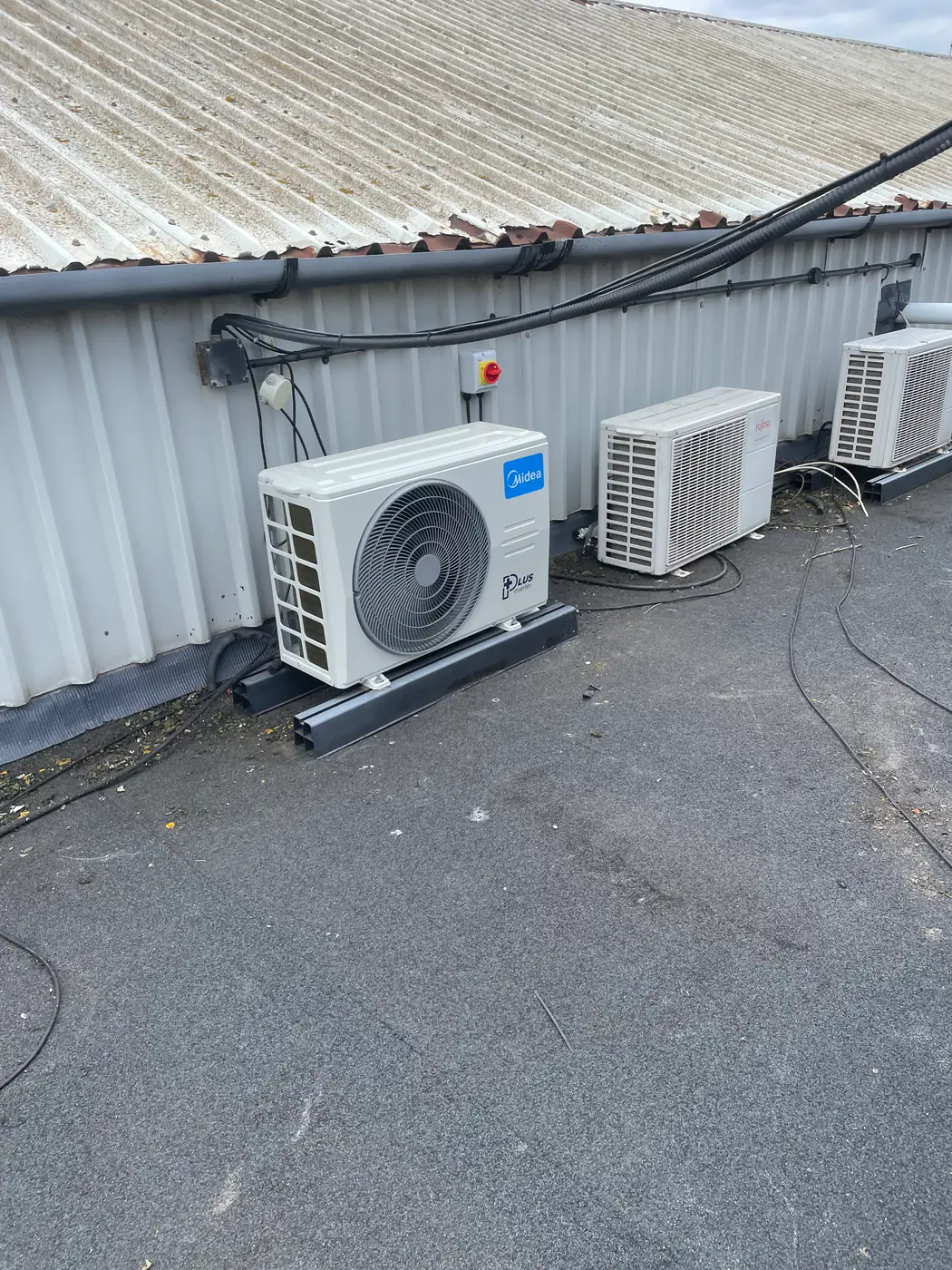 Outdoor unit installation by our Bolton engineers Multiple air conditioning condensers on a commercial site